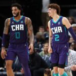Charlotte Hornets guard LaMelo Ball (2) and Charlotte Hornets forward Miles Bridges (0) wait for play to resume during the second half against the Memphis Grizzles at FedExForum.