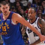 DENVER, CO - NOVEMBER 2: Nikola Jokic #15 of the Denver Nuggets boxes out DeMar DeRozan #10 of the Sacramento Kings during the game on November 22, 2025 at Ball Arena in Denver, Colorado. (Photo by Bart Young/NBAE via Getty Images)