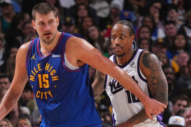 DENVER, CO - NOVEMBER 2: Nikola Jokic #15 of the Denver Nuggets boxes out DeMar DeRozan #10 of the Sacramento Kings during the game on November 22, 2025 at Ball Arena in Denver, Colorado. (Photo by Bart Young/NBAE via Getty Images)