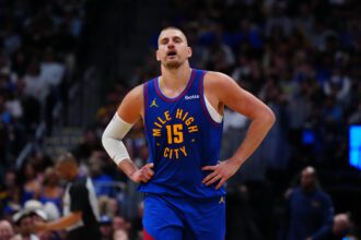Apr 20, 2026; Denver, Colorado, USA; Denver Nuggets center Nikola Jokic (15) reacts in the second half against the Minnesota Timberwolves during game two of the first round of the 2026 NBA Playoffs at Ball Arena. Mandatory Credit: Ron Chenoy-Imagn Images