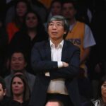 Los Angeles Lakers minority owner and Los Angeles Times owner Patrick Soon-Shiong reacts during the game against the San Antonio Spurs at Staples Center.