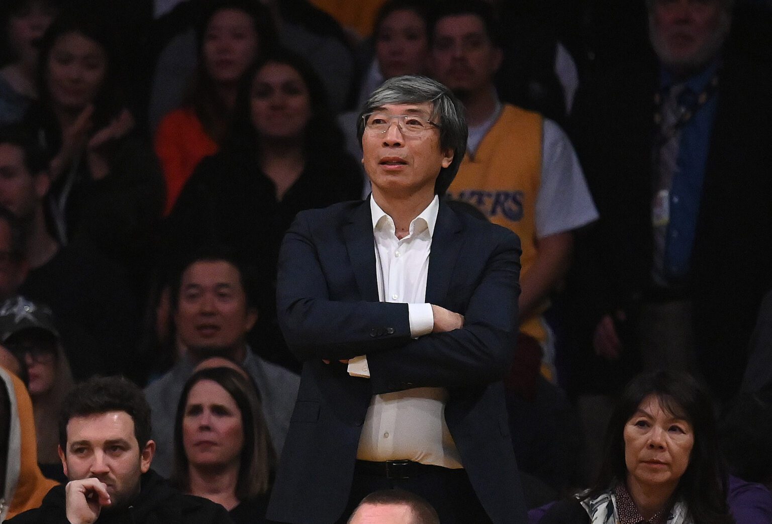 Los Angeles Lakers minority owner and Los Angeles Times owner Patrick Soon-Shiong reacts during the game against the San Antonio Spurs at Staples Center.