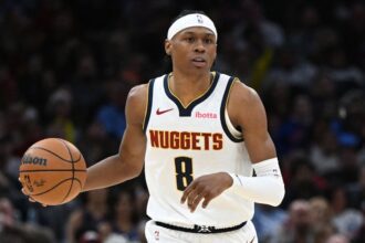 CLEVELAND, OH - JANUARY 2: Peyton Watson #8 of the Denver Nuggets dribbles the ball during the game against the Cleveland Cavaliers on January 2, 2026 at Rocket Arena in Cleveland, Ohio. (Photo by Brian Kolin/NBAE via Getty Images)