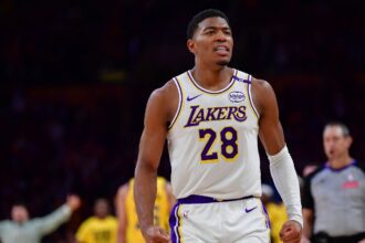 Feb 8, 2025; Los Angeles, California, USA; Los Angeles Lakers forward Rui Hachimura (28) reacts after dunking for the basket against the Indiana Pacers during the second half at Crypto.com Arena. Mandatory Credit: Gary A. Vasquez-Imagn Images