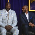 Mar 24, 2017; Los Angeles, CA, USA; Los Angeles Lakers former center Shaquille O'Neal (left) and guard Kobe Bryant react during ceremony to unveil statue of O'Neal at Staples Center. Mandatory Credit: Kirby Lee-USA TODAY Sports