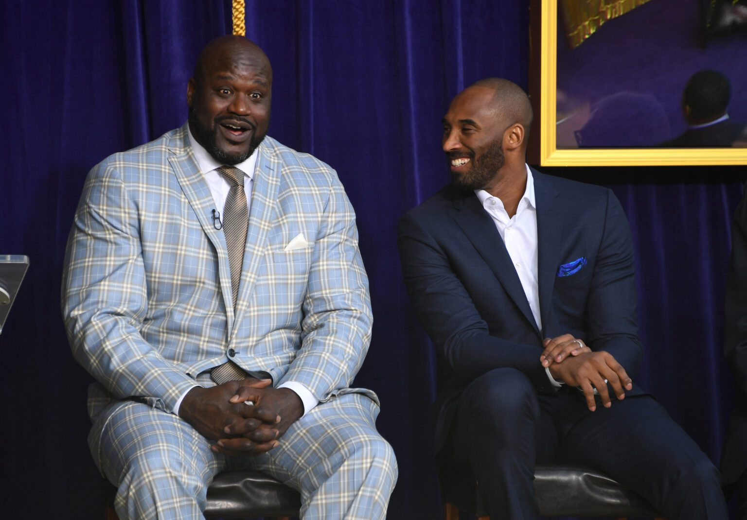 Mar 24, 2017; Los Angeles, CA, USA; Los Angeles Lakers former center Shaquille O'Neal (left) and guard Kobe Bryant react during ceremony to unveil statue of O'Neal at Staples Center. Mandatory Credit: Kirby Lee-USA TODAY Sports