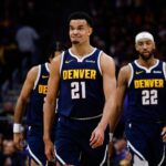Jan 20, 2026; Denver, Colorado, USA; Denver Nuggets forward Spencer Jones (21) reacts after a play in the third quarter against the Los Angeles Lakers at Ball Arena. Mandatory Credit: Isaiah J. Downing-Imagn Images