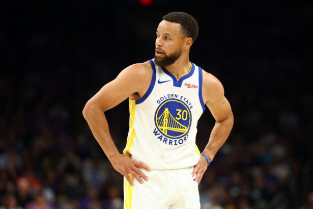 Apr 17, 2026; Phoenix, Arizona, USA; Golden State Warriors guard Stephen Curry (30) against the Phoenix Suns during the play-in rounds of the 2026 NBA Playoffs at Mortgage Matchup Center. Mandatory Credit: Mark J. Rebilas-Imagn Images
