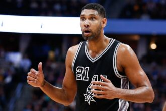 Apr 8, 2016; Denver, CO, USA; San Antonio Spurs center Tim Duncan (21) reacts after a call in the fourth quarter against the Denver Nuggets at the Pepsi Center. The Nuggets defeated the Spurs 102-98. Mandatory Credit: Isaiah J. Downing-USA TODAY Sports