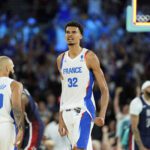 Aug 10, 2024; Paris, France; France power forward Victor Wembanyama (32) reacts in the first half against the United States in the men's basketball gold medal game during the Paris 2024 Olympic Summer Games at Accor Arena. Mandatory Credit: Kyle Terada-USA TODAY Sports
