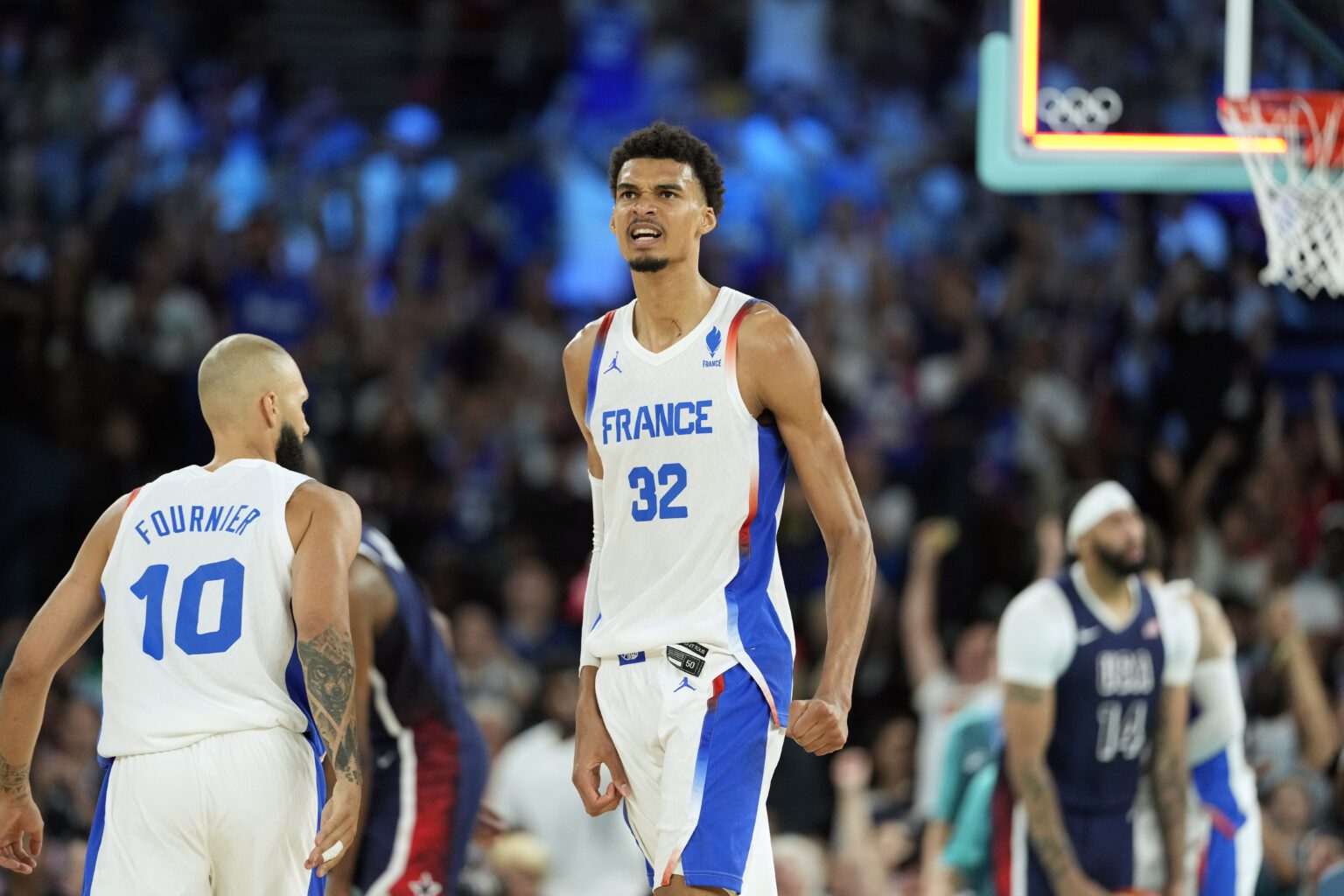 Aug 10, 2024; Paris, France; France power forward Victor Wembanyama (32) reacts in the first half against the United States in the men's basketball gold medal game during the Paris 2024 Olympic Summer Games at Accor Arena. Mandatory Credit: Kyle Terada-USA TODAY Sports