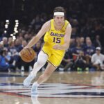 Oklahoma City, Oklahoma, USA; Los Angeles Lakers guard Austin Reaves (15) dribbles down the court against the Oklahoma City Thunder in the first half during game two of the second round of the 2026 NBA Playoffs at Paycom Center. Mandatory Credit: Alonzo Adams-Imagn Images