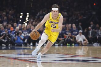 Oklahoma City, Oklahoma, USA; Los Angeles Lakers guard Austin Reaves (15) dribbles down the court against the Oklahoma City Thunder in the first half during game two of the second round of the 2026 NBA Playoffs at Paycom Center. Mandatory Credit: Alonzo Adams-Imagn Images