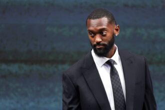 Miami, FL, USA; Miami Heat forward Bobby Portis (95) arrives to his introductory press conference at Kaseya Center. Mandatory Credit: Sam Navarro-Imagn Images