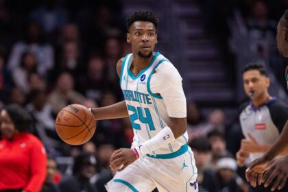 Charlotte, North Carolina, USA; Charlotte Hornets forward Brandon Miller (24) brings the ball up court against the Portland Trail Blazers during the first quarter at Spectrum Center. Mandatory Credit: Scott Kinser-Imagn Images