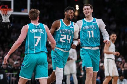 Apr 7, 2026; Boston, Massachusetts, USA; Charlotte Hornets center Ryan Kalkbrenner (11), forward Brandon Miller (24) and guard Kon Knueppel (7) react after a basket against the Boston Celtics in the second quarter at TD Garden. Mandatory Credit: David Butler II-Imagn Images
