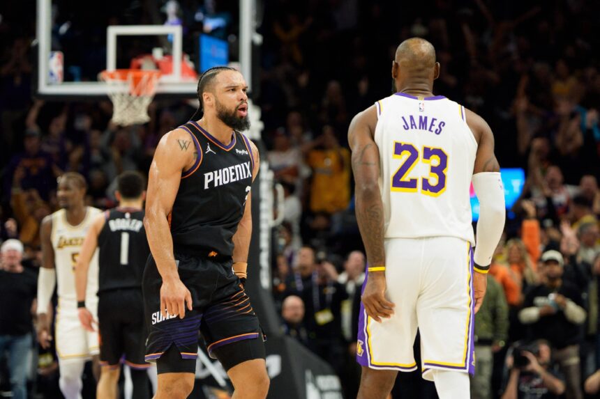 Phoenix, Arizona, USA; Phoenix Suns forward Dillon Brooks (3) and Los Angeles Lakers forward LeBron James (23) react during an altercation that resulted in a technical for Brooks during the second half of a game at at Mortgage Matchup Center. Mandatory Credit: Allan Henry-Imagn Images