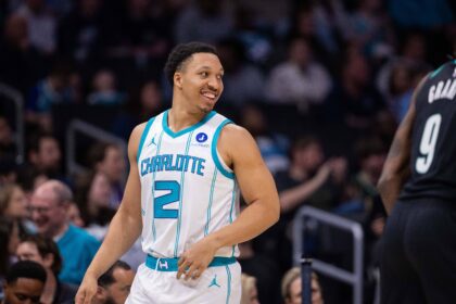 Charlotte, North Carolina, USA; Charlotte Hornets forward Grant Williams (2) reacts during the first quarter against the Portland Trail Blazers in the first half at Spectrum Center. Mandatory Credit: Scott Kinser-Imagn Images