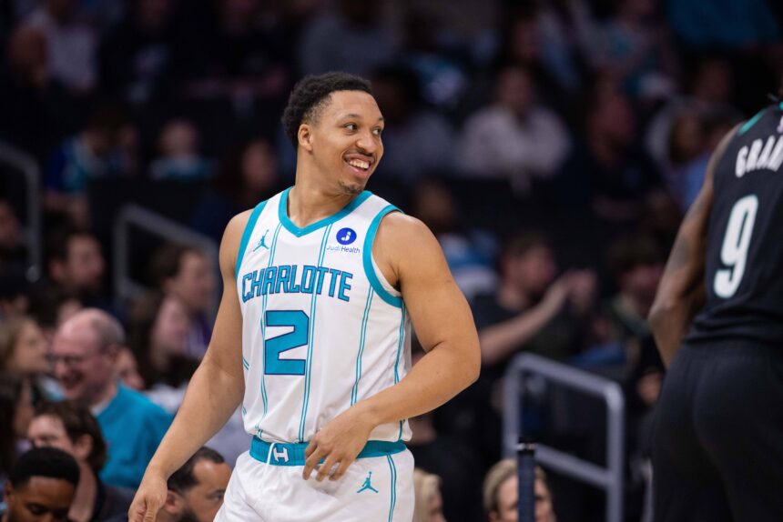 Charlotte, North Carolina, USA; Charlotte Hornets forward Grant Williams (2) reacts during the first quarter against the Portland Trail Blazers in the first half at Spectrum Center. Mandatory Credit: Scott Kinser-Imagn Images