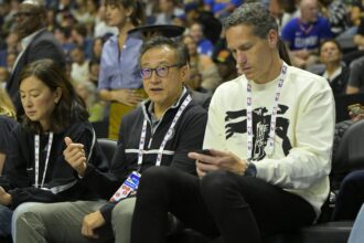 Oceanside, California, USA; Brooklyn Nets owners Clara Wu and Joseph Tsai along with Chief Executive officer Sam Zussman attend the preseason game against the Los Angeles Clippers at Frontwave Arena. Mandatory Credit: Jayne Kamin-Oncea-Imagn Images