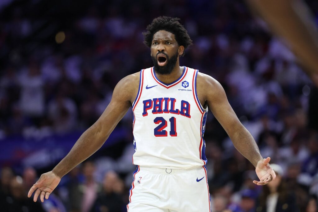 Philadelphia, Pennsylvania, USA; Philadelphia 76ers center Joel Embiid (21) reacts to a play against the New York Knicks during the first quarter of game three of the second round of the 2026 NBA Playoffs at Xfinity Mobile Arena. Mandatory Credit: Bill Streicher-Imagn Images