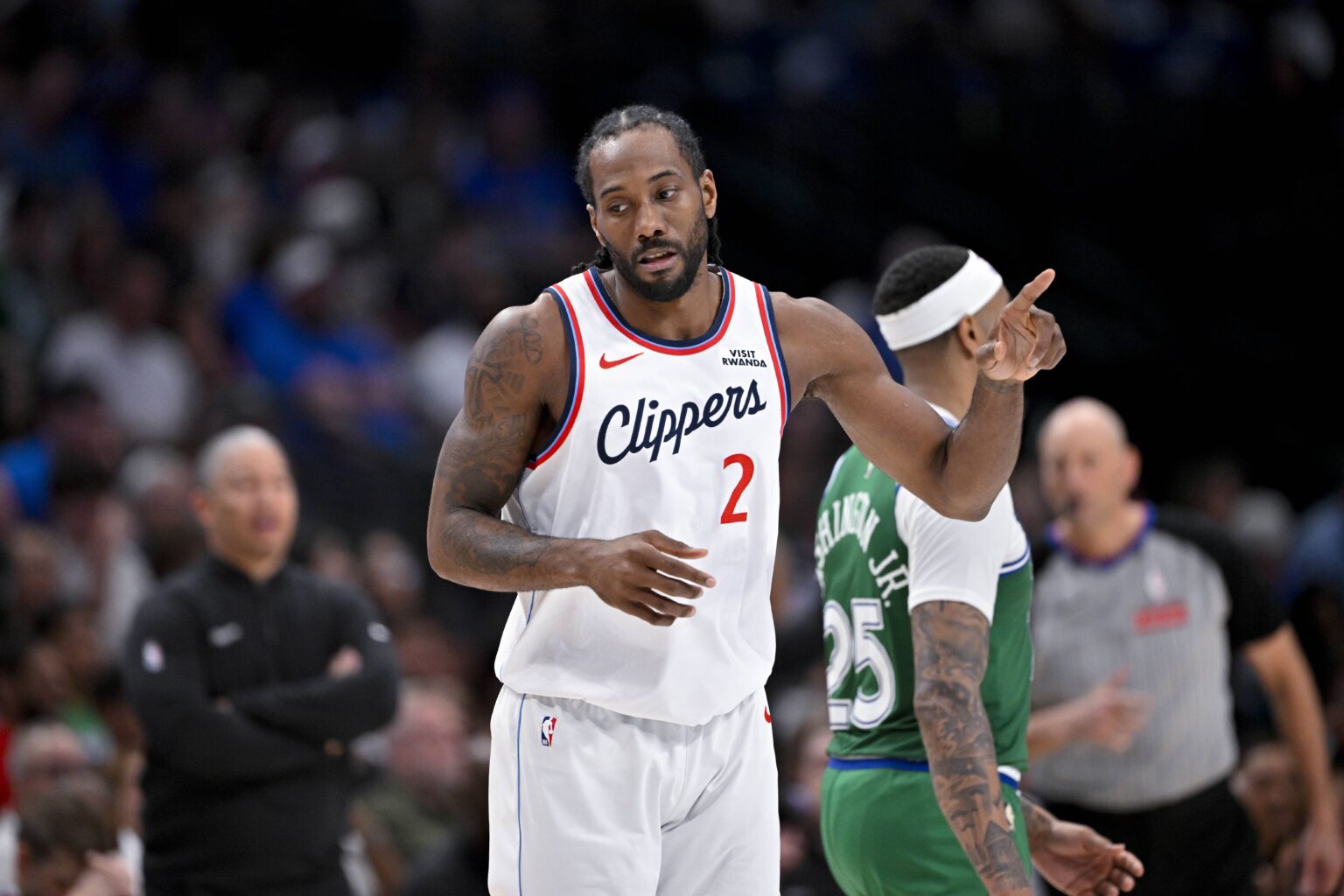 Dallas, Texas, USA; LA Clippers forward Kawhi Leonard (2) runs back up court during the game between the Mavericks and the Clippers at American Airlines Center. Mandatory Credit: Jerome Miron-Imagn Images