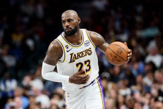 Dallas, Texas, USA; Los Angeles Lakers forward LeBron James (23) controls the ball against the Dallas Mavericks during the second half at American Airlines Center. Mandatory Credit: Kevin Jairaj-Imagn Images