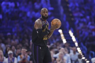 Oklahoma City, Oklahoma, USA; Los Angeles Lakers forward LeBron James (23) moves the ball down the court against the Oklahoma City Thunder during the first quarter at Paycom Center. Mandatory Credit: Alonzo Adams-Imagn Images