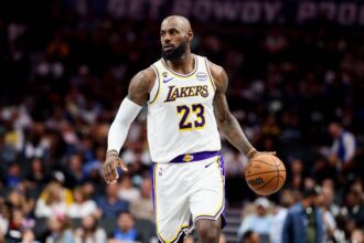 Dallas, Texas, USA; Los Angeles Lakers forward LeBron James (23) controls the ball against the Dallas Mavericks during the second half at American Airlines Center. Mandatory Credit: Kevin Jairaj-Imagn Images