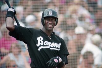 Birmingham Barons right fielder Michael Jordan gets loose in the on-deck circle as he waits his turn to bat against the Nashville Xpress at Greer Stadium in Nashville on April 24, 1994.