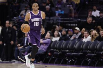 Sacramento, California, USA; Sacramento Kings guard Russell Westbrook (18) brings the ball down the court against the Orlando Magic during the third quarter at Golden 1 Center. Mandatory Credit: Kelley L Cox-Imagn Images