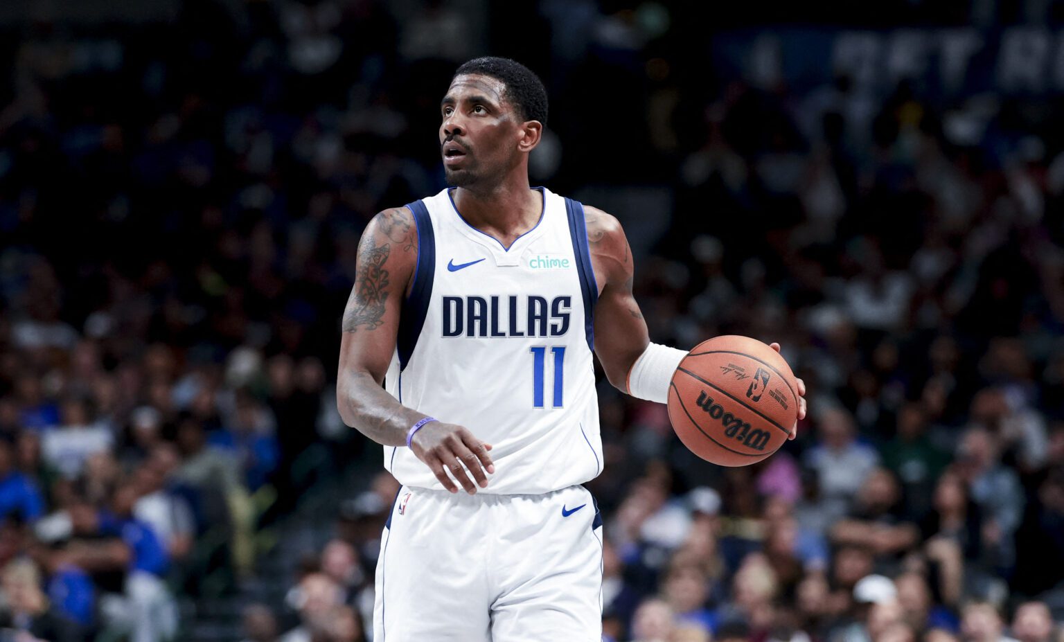 Feb 27, 2025; Dallas, Texas, USA; Dallas Mavericks guard Kyrie Irving (11) controls the ball against the Charlotte Hornets during the second half at American Airlines Center. Mandatory Credit: Kevin Jairaj-Imagn Images