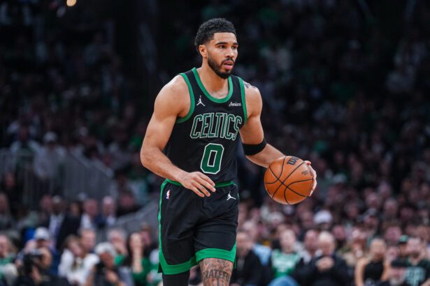 Apr 28, 2026; Boston, Massachusetts, USA; Boston Celtics forward Jayson Tatum (0) returns up court against the Philadelphia 76ers in the second half during game five of the first round of the 2026 NBA Playoffs at TD Garden. Mandatory Credit: David Butler II-Imagn Images