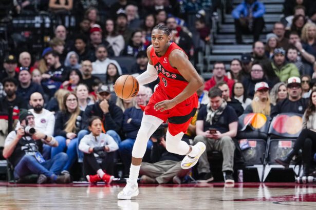 Feb 8, 2026; Toronto, Ontario, CAN; Toronto Raptors forward RJ Barrett (9) dribbles the Indiana Pacers during the second half at Scotiabank Arena. Mandatory Credit: Kevin Sousa-Imagn Images