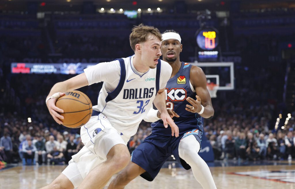 Dec 5, 2025; Oklahoma City, Oklahoma, USA; Dallas Mavericks forward Cooper Flagg (32) drives to the basket around Oklahoma