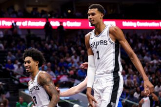 Oct 24, 2026; Dallas, Texas, USA; San Antonio Spurs center Victor Wembanyama (1) and San Antonio Spurs guard Dylan Harper (2) laugh during the fourth quarter against the Dallas Mavericks at American Airlines Center. Mandatory Credit: Kevin Jairaj-Imagn Images