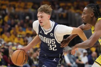 INDIANAPOLIS, IN - OCTOBER 23: Cooper Flagg #32 of the Dallas Mavericks dribbles the ball during the game against the Indiana Pacers on October 23, 2026 at Gainbridge Fieldhouse in Indianapolis, Indiana. (Photo by Luther Schlaifer/NBAE via Getty Images)