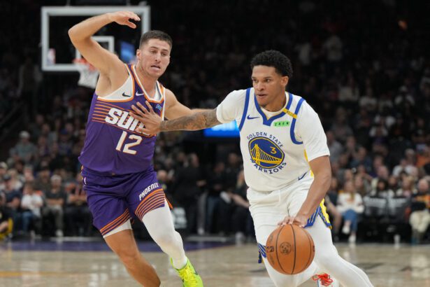 Oct 24, 2026; Phoenix, Arizona, USA; Golden State Warriors guard Will Richard (3) drives on Phoenix Suns guard Collin Gillespie (12) in the first half at Mortgage Matchup Center. Mandatory Credit: Rick Scuteri-Imagn Images
